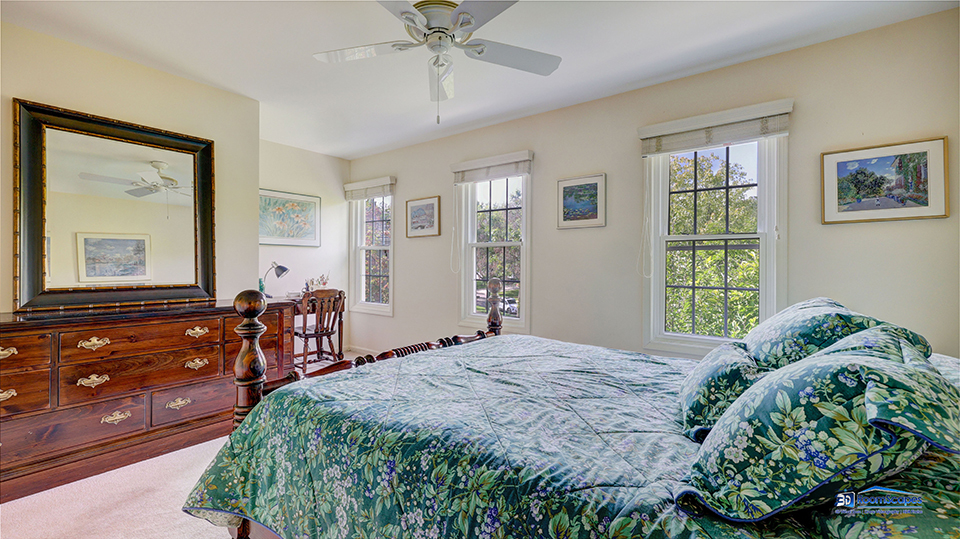 245 Pilgrims Path Gurnee, IL 60031 - Photo 30 of 54 a bedroom with a bed mirror and window