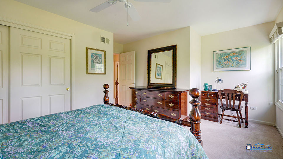 245 Pilgrims Path Gurnee, IL 60031 - Photo 31 of 54 a bedroom with a bed and furniture