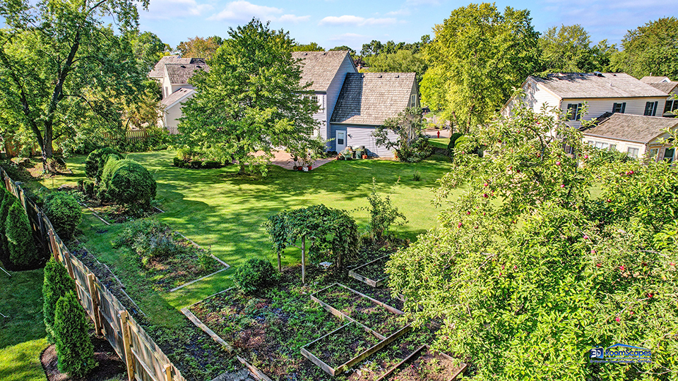 245 Pilgrims Path Gurnee, IL 60031 - Photo 45 of 54 a view of a garden with plants