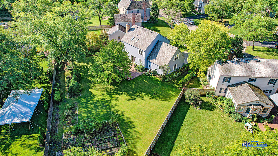 245 Pilgrims Path Gurnee, IL 60031 - Photo 47 of 54 an aerial view of a house with garden space and a lake view