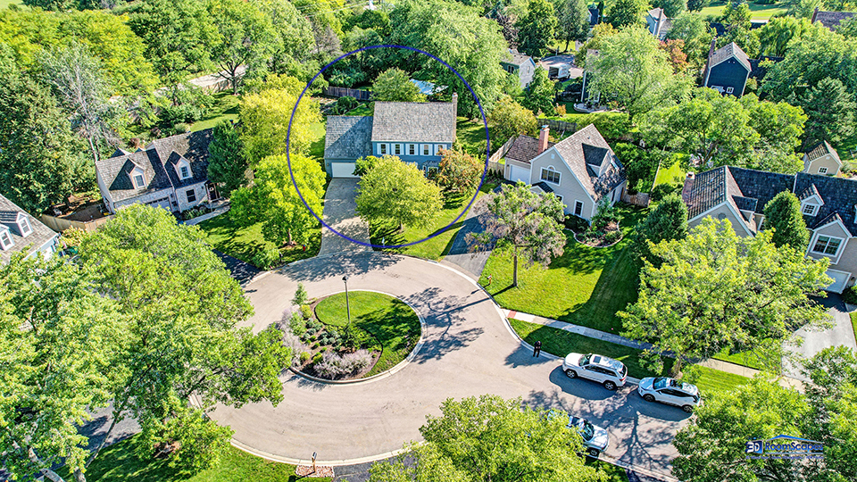 245 Pilgrims Path Gurnee, IL 60031 - Photo 49 of 54 an aerial view of a house with a yard and garden