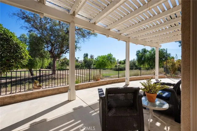 a view of livingroom with furniture and a window