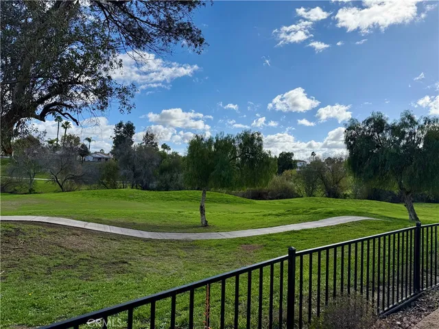 a dining room with furniture and chandelier