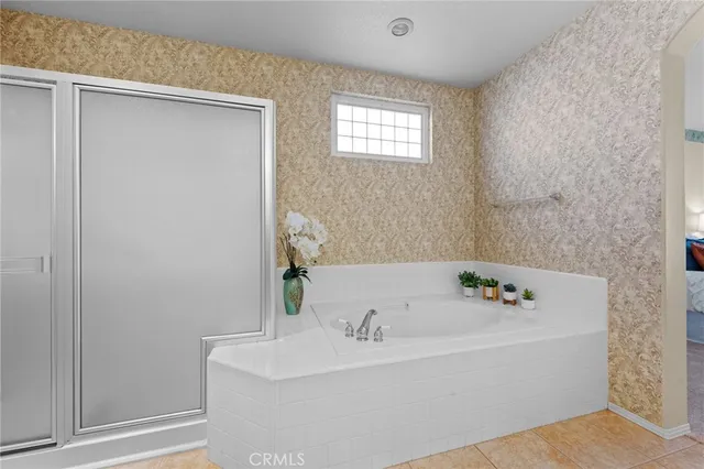 a utility room with sink dryer and washer