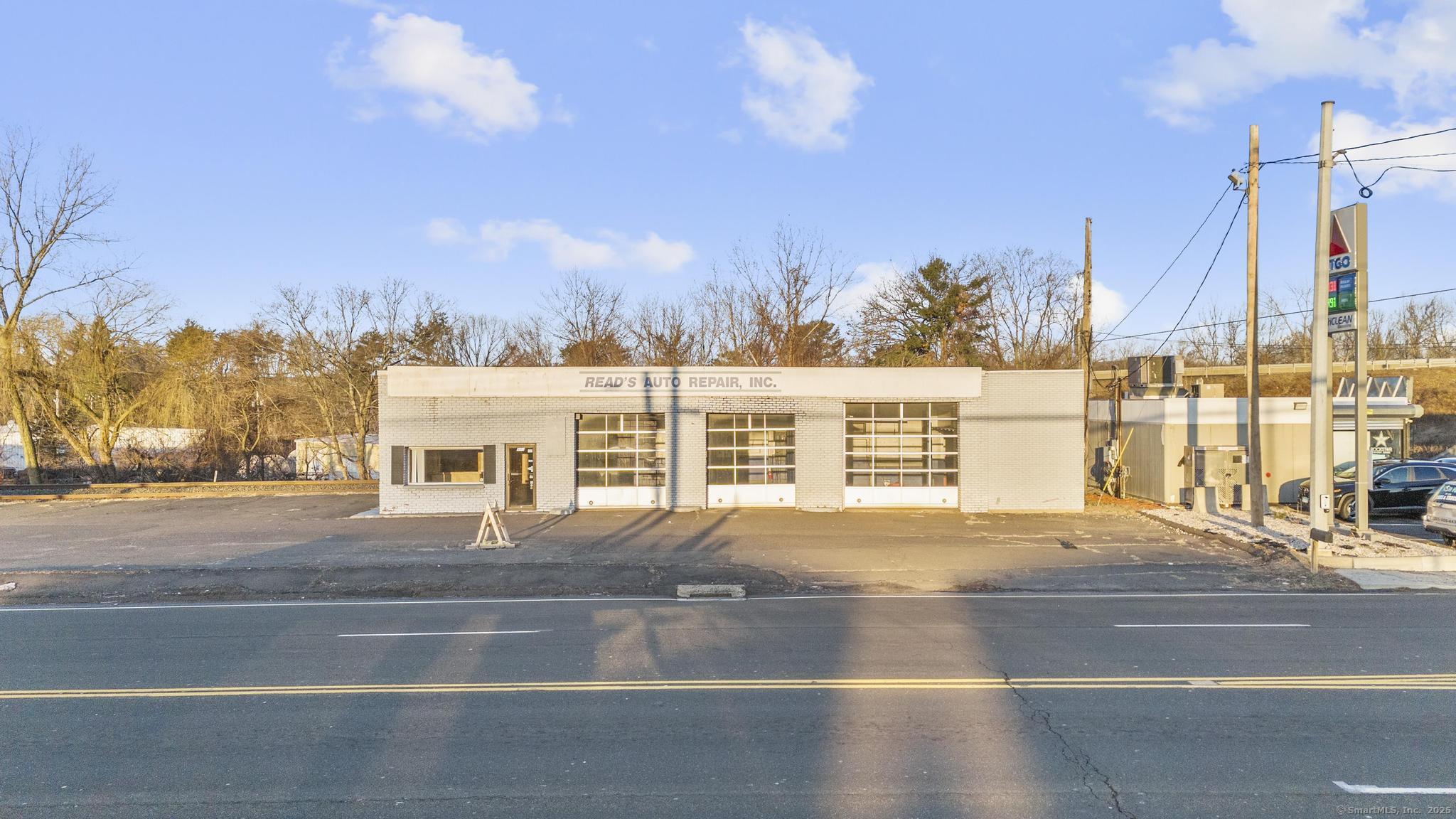a view of a building with mountains