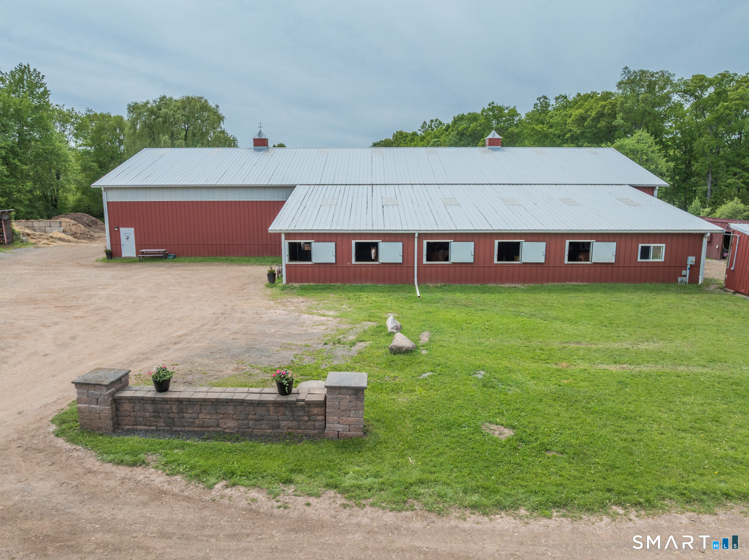 949 North Street Suffield, CT 06078 - Photo 21 of 33 a front view of a house with garden