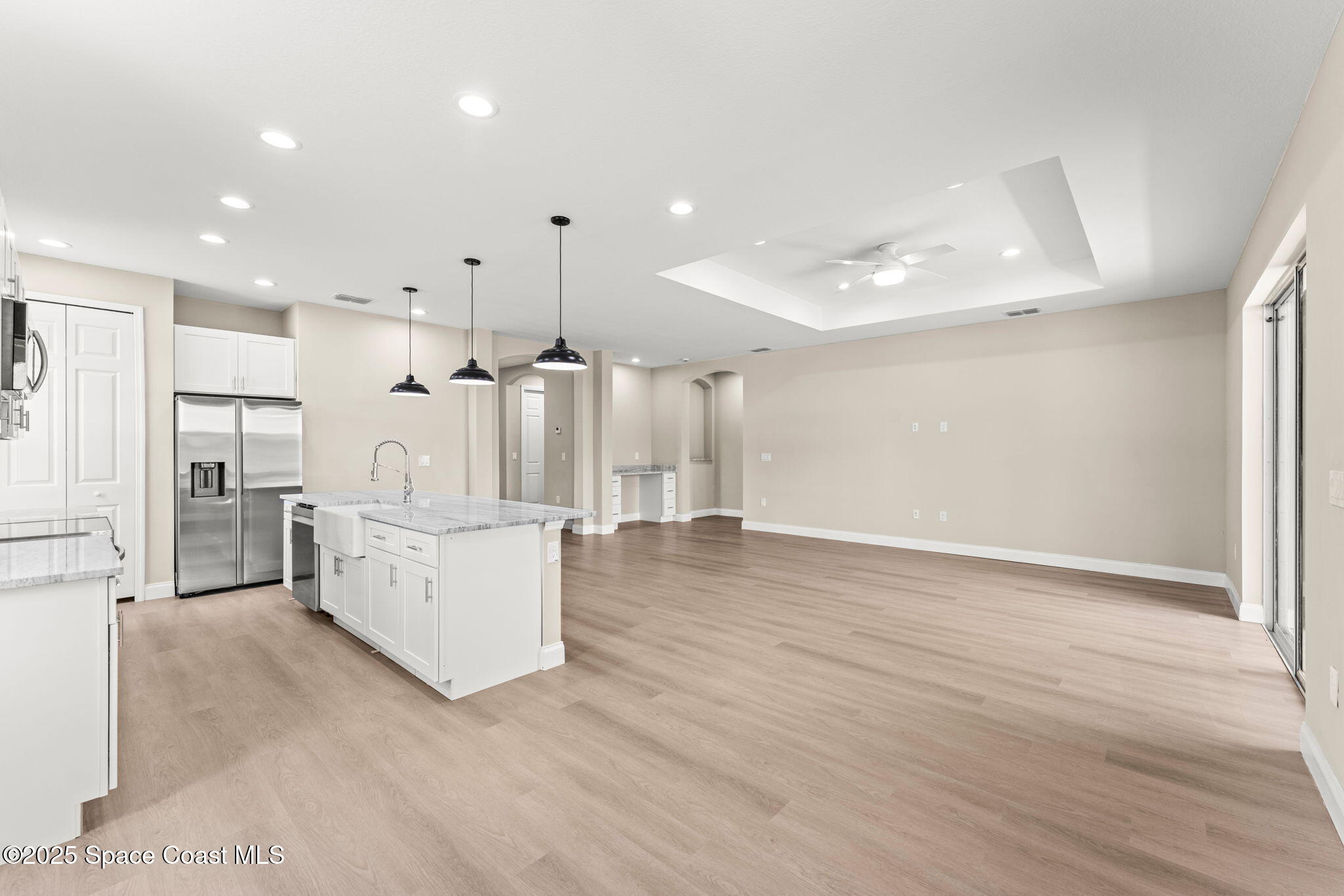 241 Sarah Road Southwest Palm Bay, FL 32908 - Photo 13 of 54 a view of kitchen with furniture and refrigerator