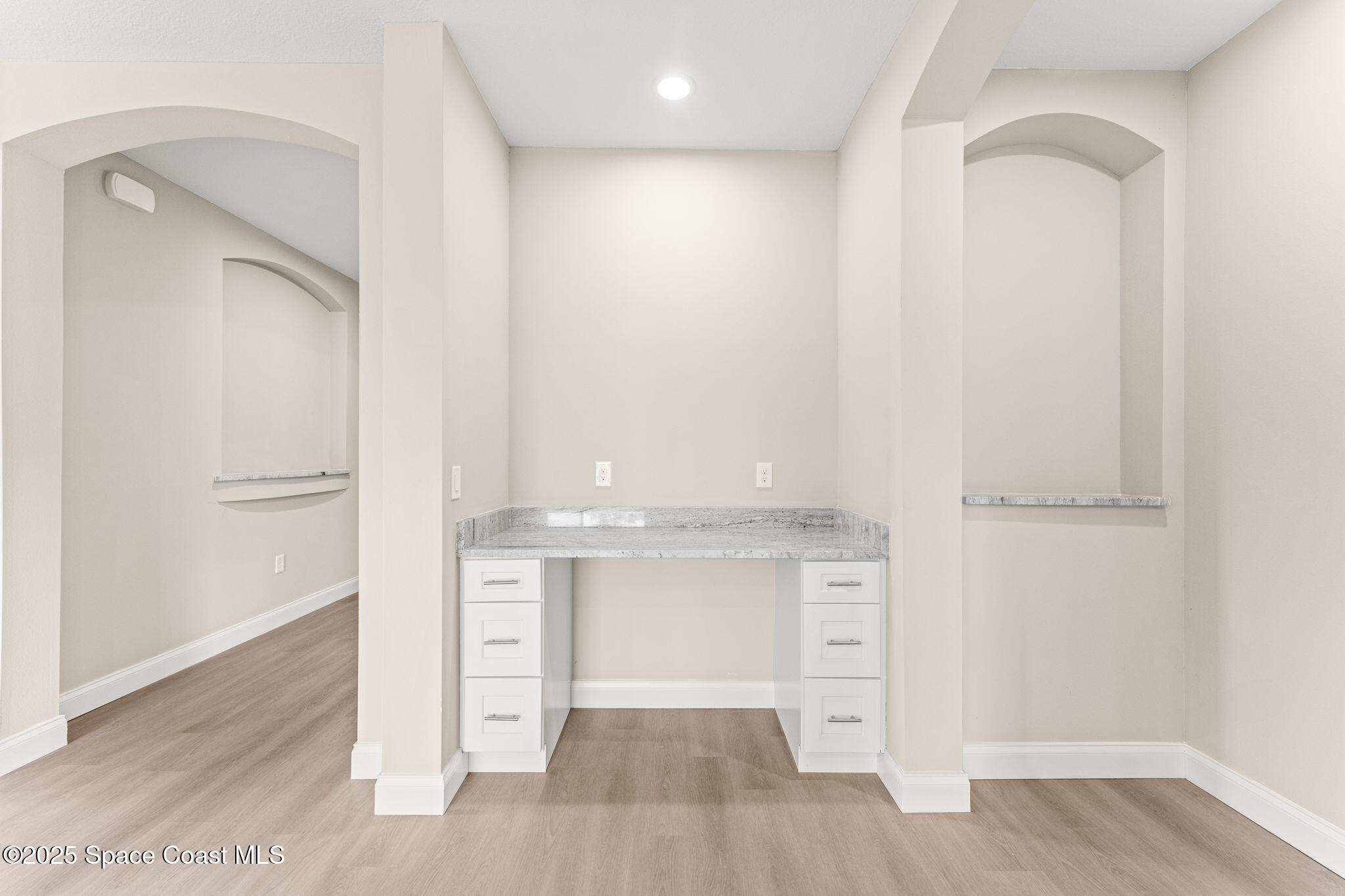 241 Sarah Road Southwest Palm Bay, FL 32908 - Photo 22 of 54 a view of cabinets with wooden floor