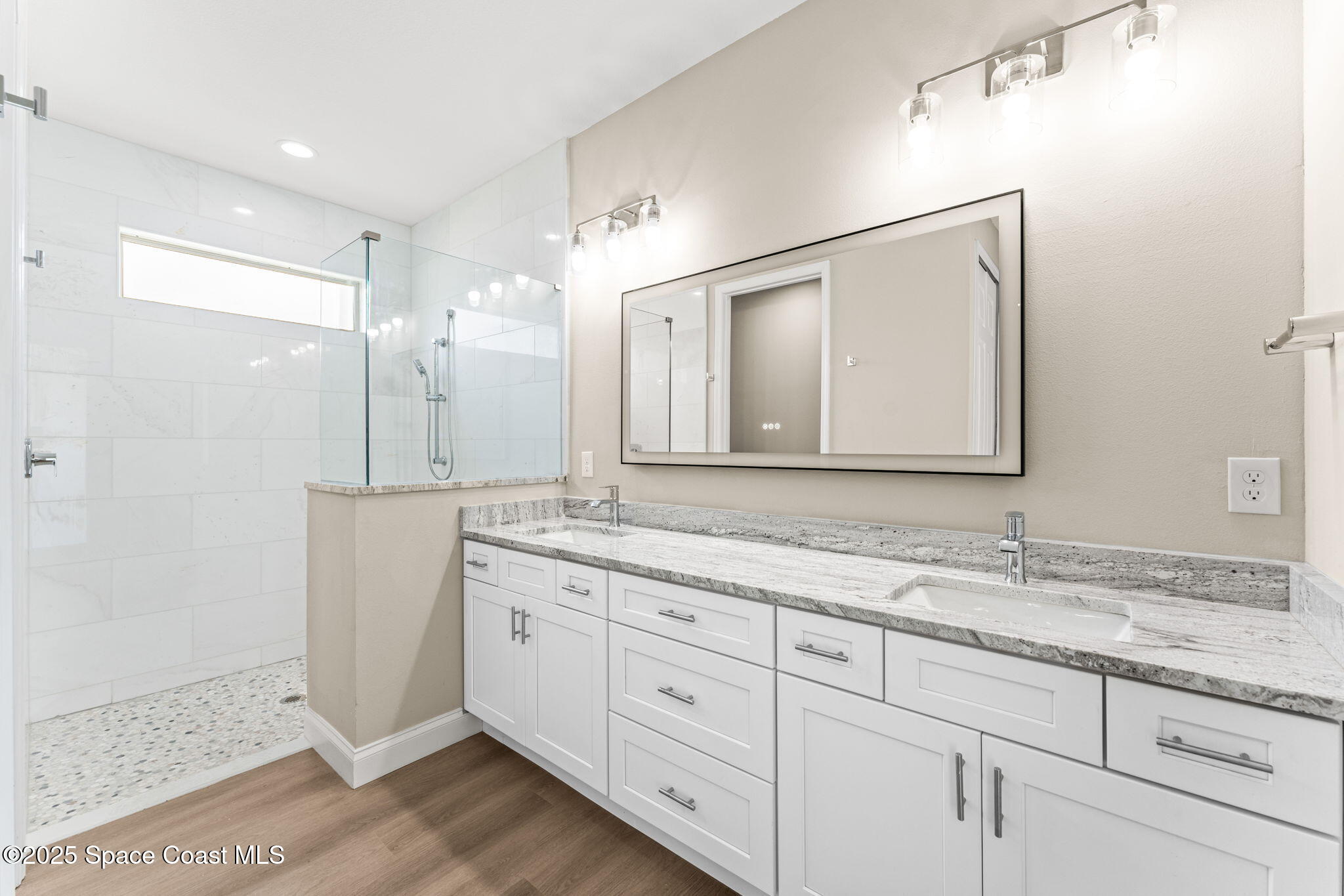 241 Sarah Road Southwest Palm Bay, FL 32908 - Photo 26 of 54 a bathroom with a granite countertop sink mirror and double