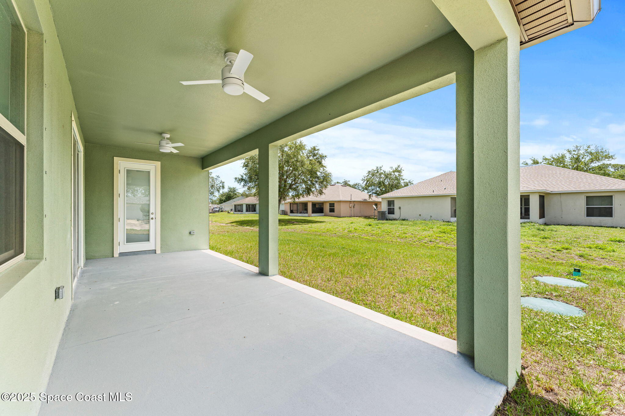 241 Sarah Road Southwest Palm Bay, FL 32908 - Photo 40 of 54 a view of an entryway with garden