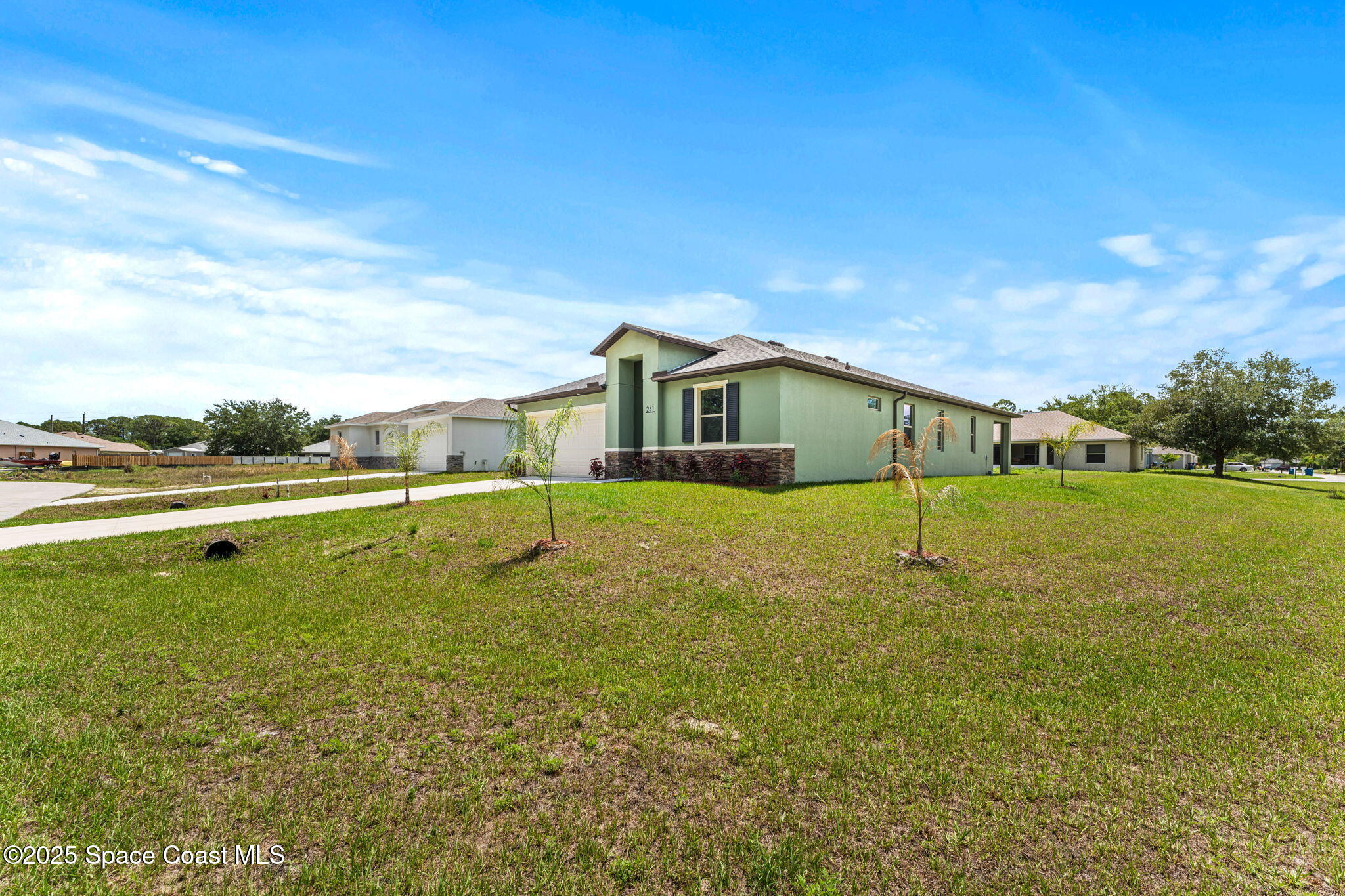 241 Sarah Road Southwest Palm Bay, FL 32908 - Photo 4 of 54 a view of a house with a swimming pool