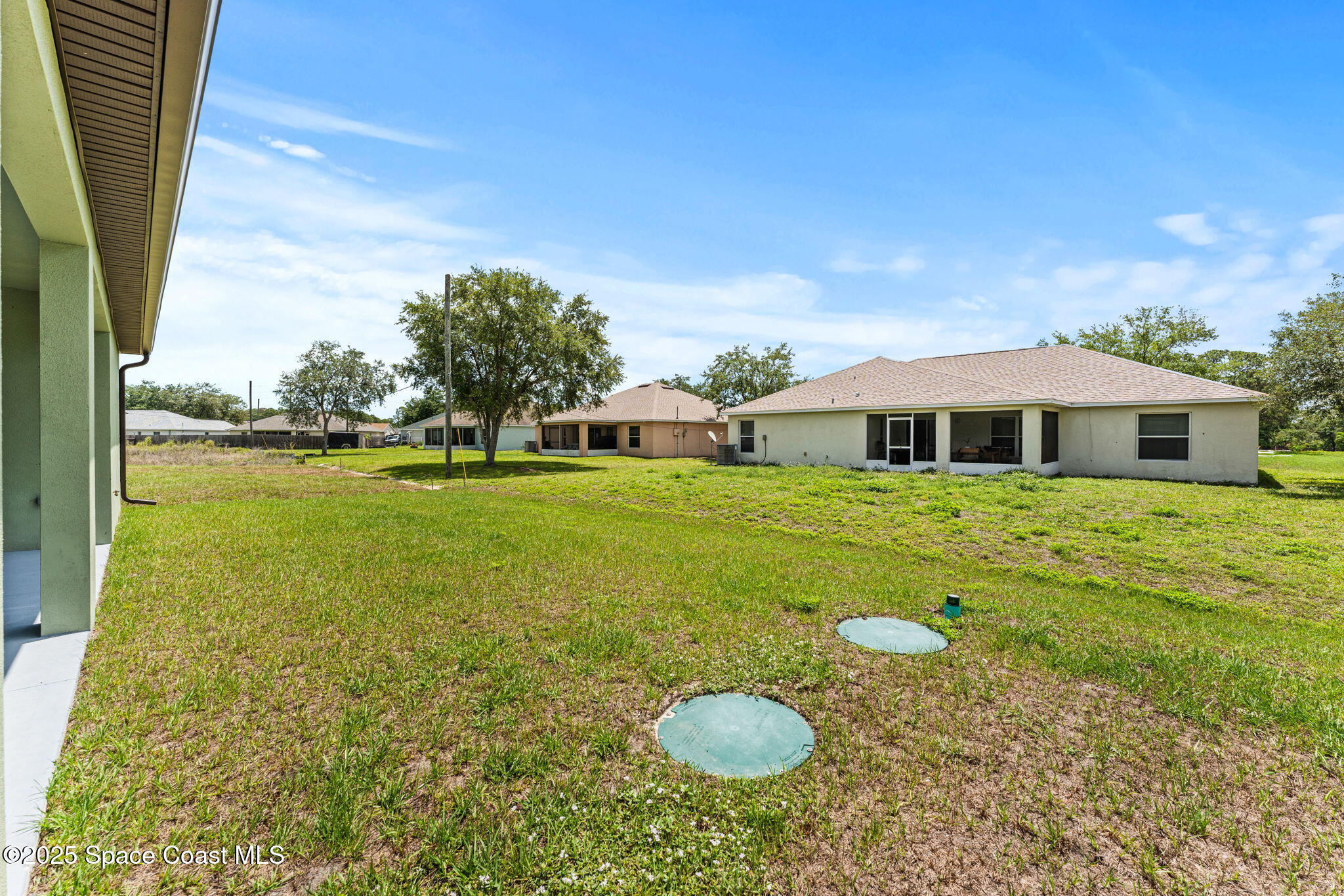 241 Sarah Road Southwest Palm Bay, FL 32908 - Photo 44 of 54 a view of a house with yard and porch