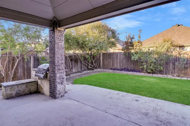 a view of a porch with a yard