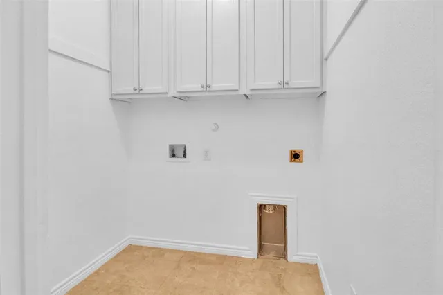 an aerial view of houses with outdoor space