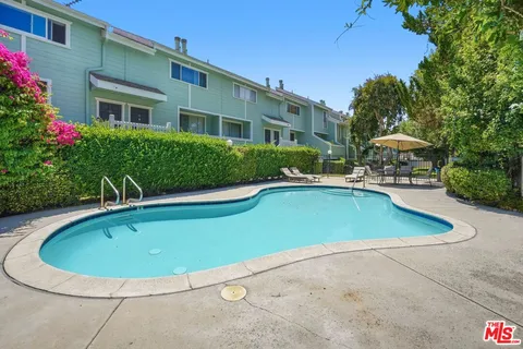 a view of outdoor space yard swimming pool and porch