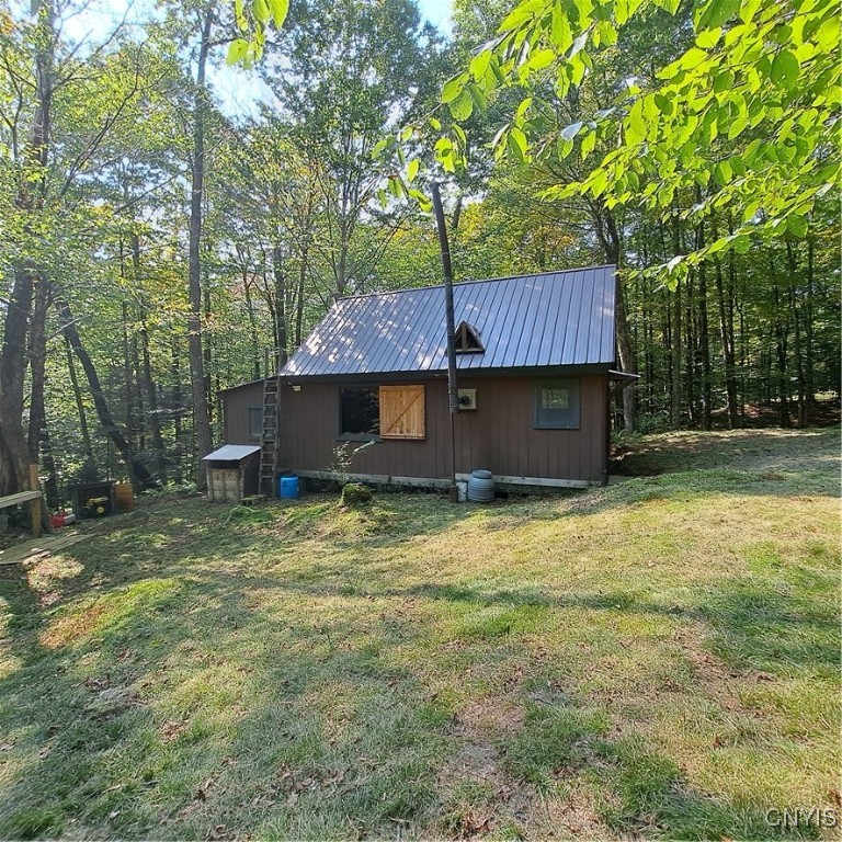 0 Sullivan Road Taberg, NY 13471 - Photo 2 of 24 Back of the camp with the security door open for t