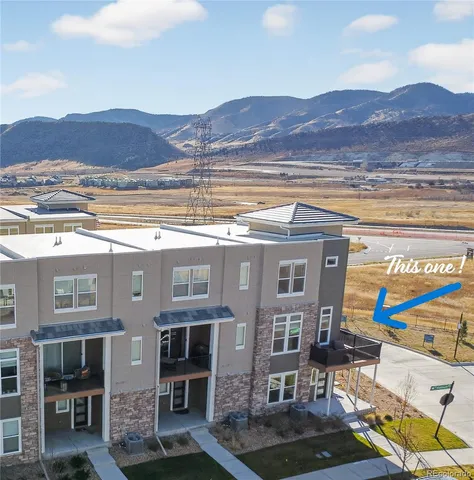 a view of a house with a ocean view