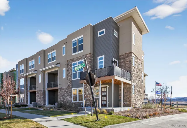 a front view of a building with street view