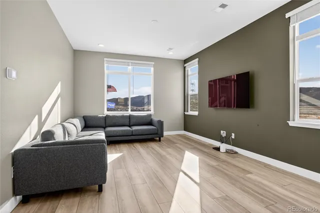 a living room with furniture and a couch
