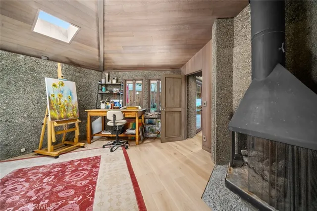 a bathroom with a sink mirror and a bathtub