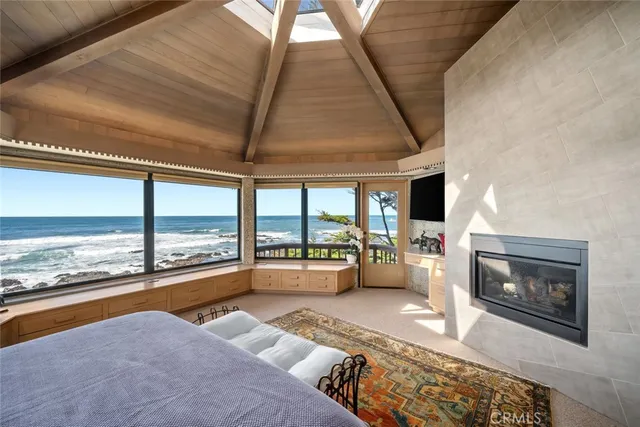 a bathroom with a granite countertop sink window and a bathtub