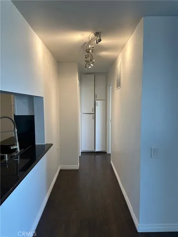 a view of a hallway with workspace