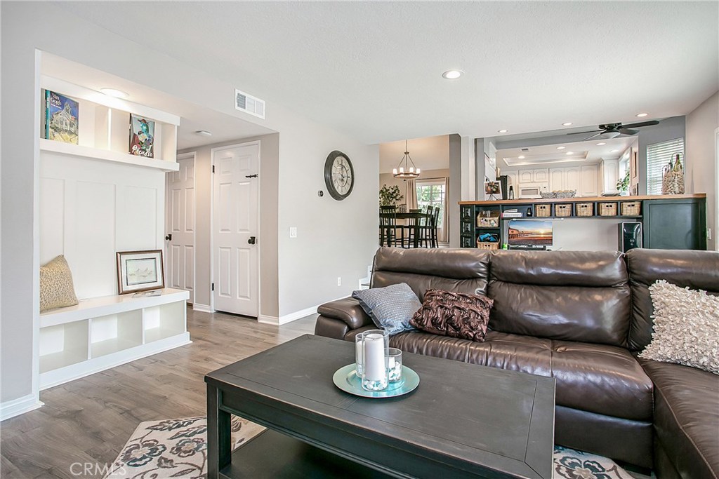 22876 Broadleaf Lake Forest, CA 92630 - Photo 12 of 26 a living room with furniture and wooden floor