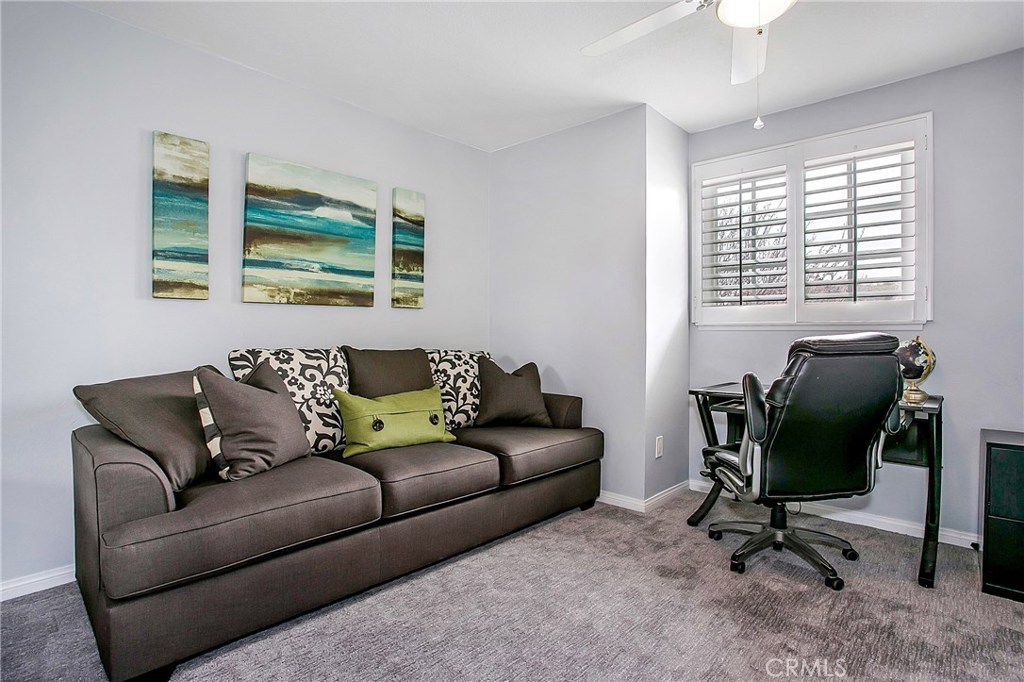22876 Broadleaf Lake Forest, CA 92630 - Photo 17 of 26 a living room with furniture and a window