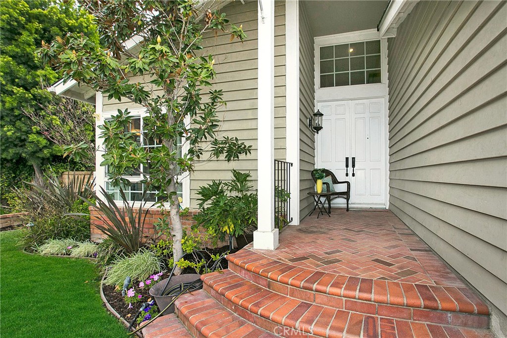 22876 Broadleaf Lake Forest, CA 92630 - Photo 2 of 26 a backyard of a house with seating space