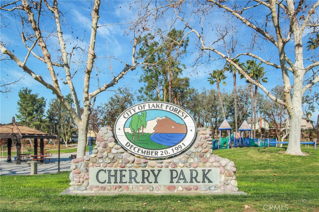 22876 Broadleaf Lake Forest, CA 92630 - Photo 24 of 26 a sign of golf club on a wall under a tree