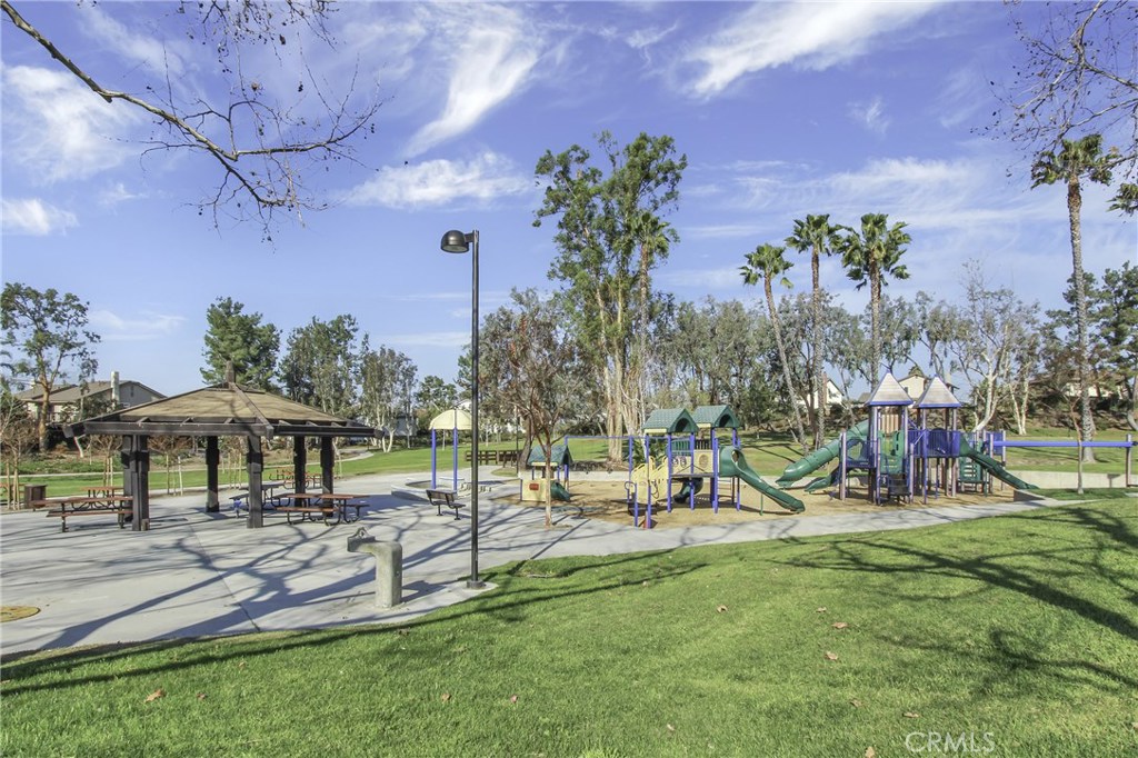22876 Broadleaf Lake Forest, CA 92630 - Photo 26 of 26 a view of a park with plants and bench