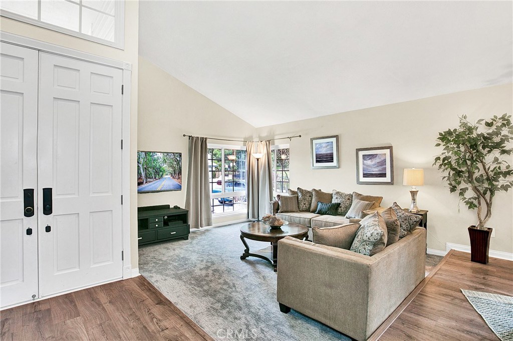 22876 Broadleaf Lake Forest, CA 92630 - Photo 3 of 26 a living room with furniture and a window