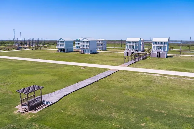 a view of a balcony with an ocean