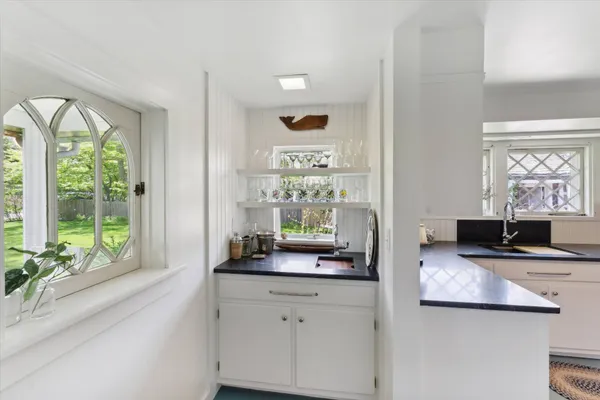a view of a living room and window