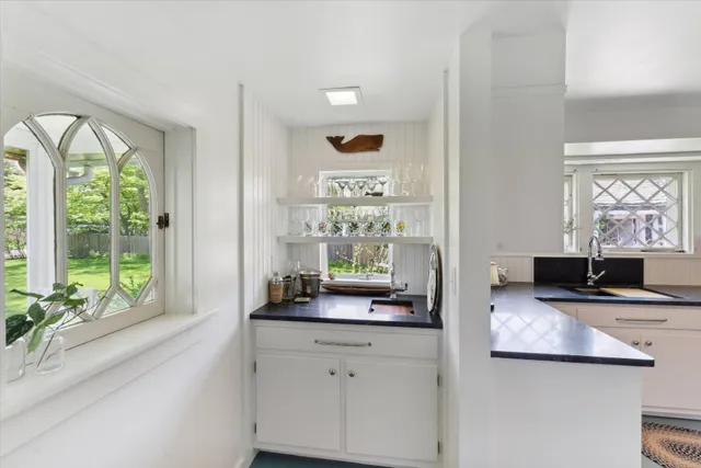 a view of a living room and window