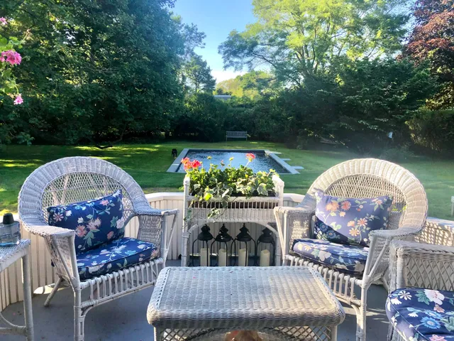 a view of a two chairs in roof deck