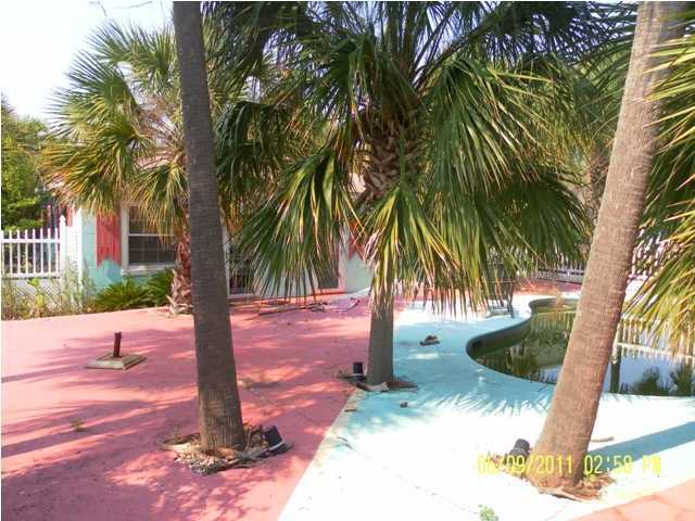 43 Miami Street Destin, FL 32550 - Photo 3 of 12 a view of a backyard