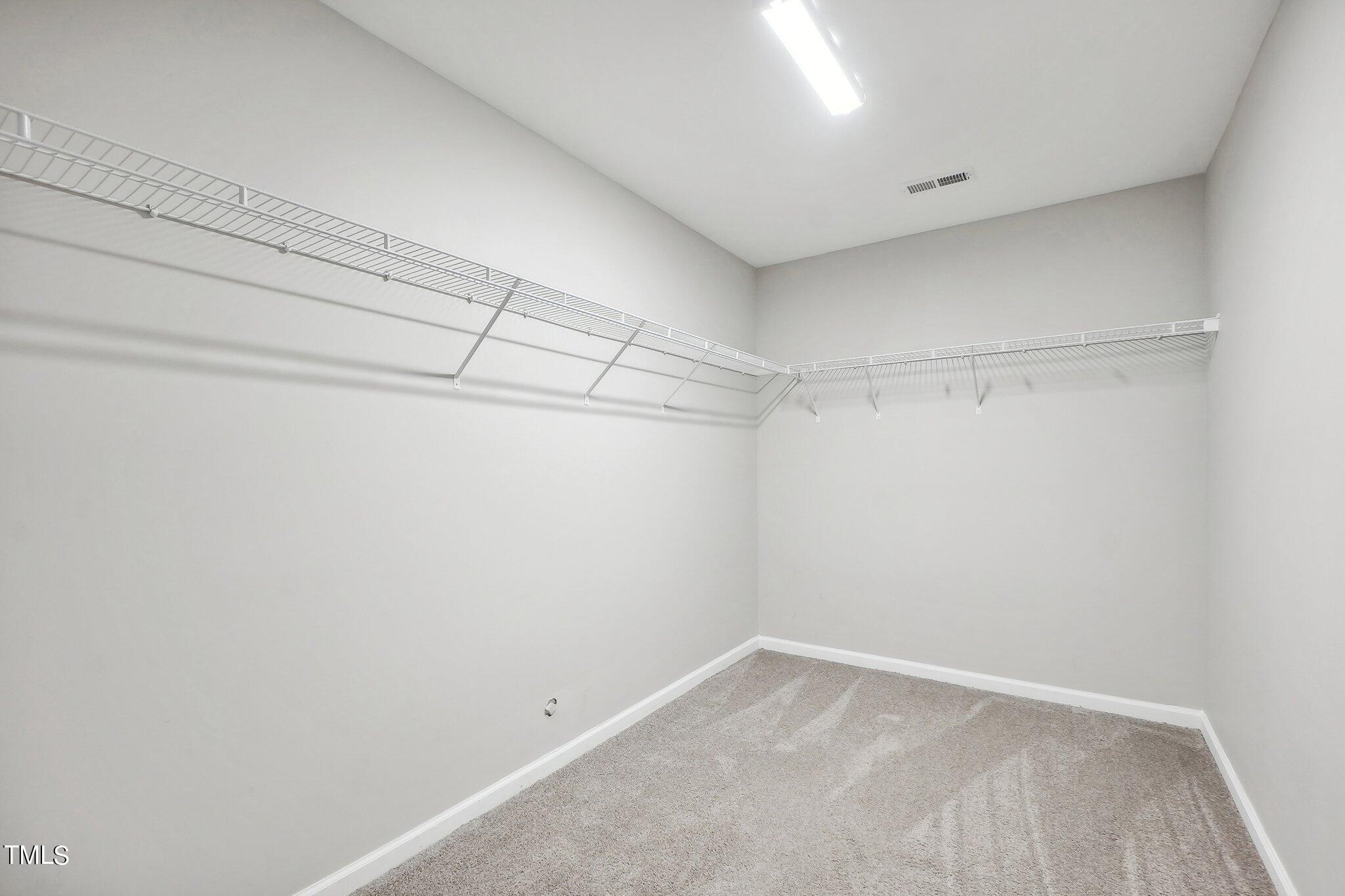 7005 Missionary Ridge Drive Raleigh, NC 27610 - Photo 21 of 27 Primary Bedroom Closet