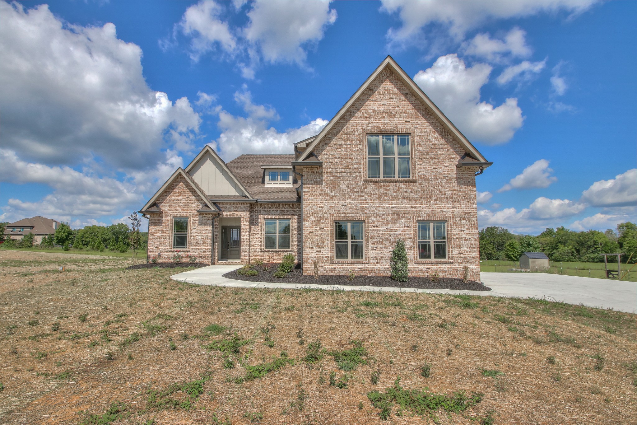 437 Burford Road Lebanon, TN 37087 - Photo 2 of 43 a front view of a house with a yard
