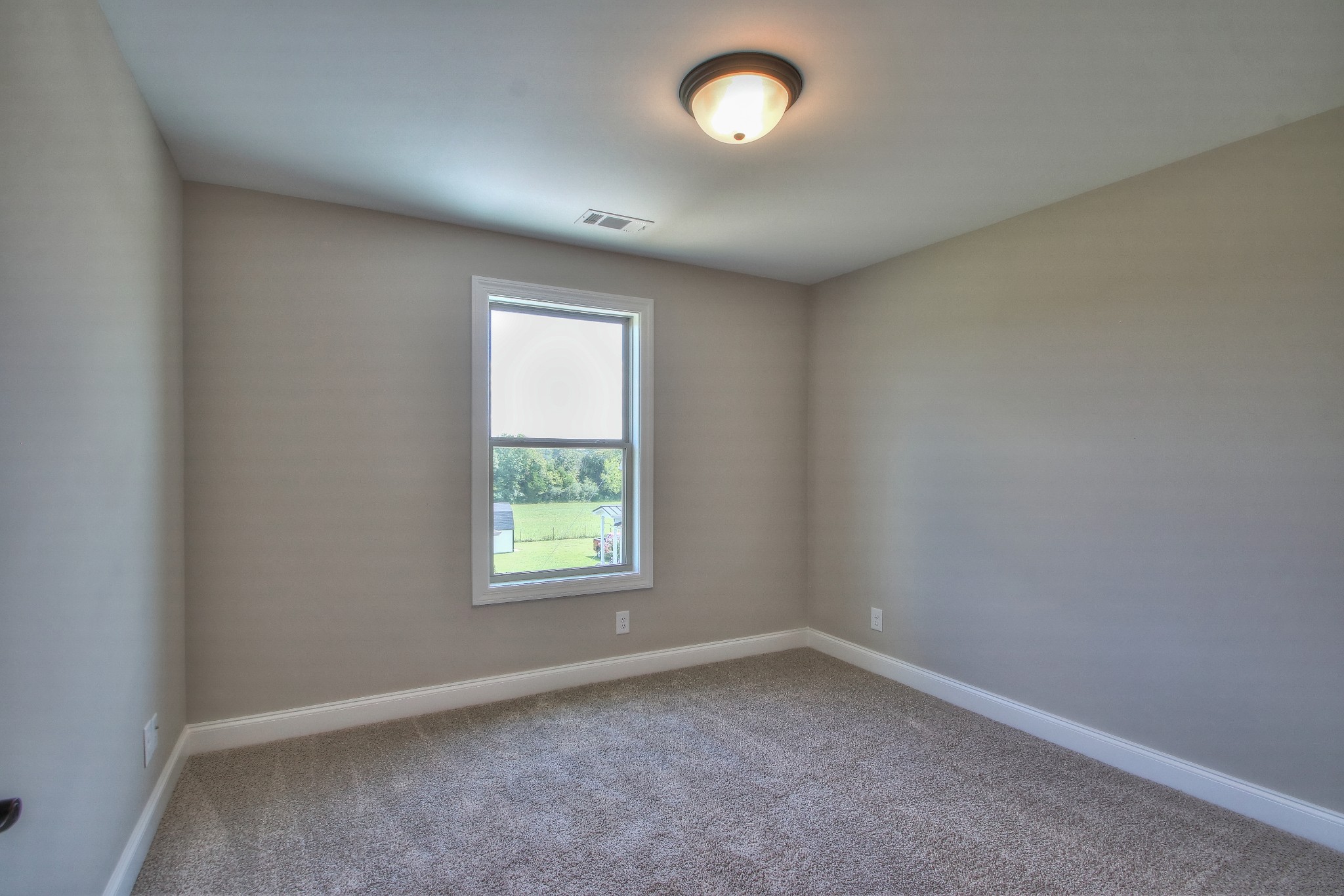 437 Burford Road Lebanon, TN 37087 - Photo 34 of 43 an empty room with a window