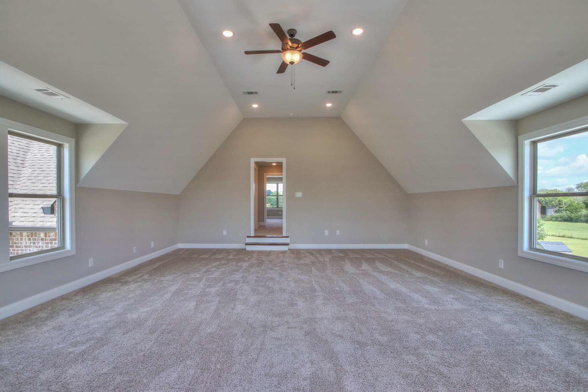 437 Burford Road Lebanon, TN 37087 - Photo 37 of 43 an empty room with chandelier fan and windows