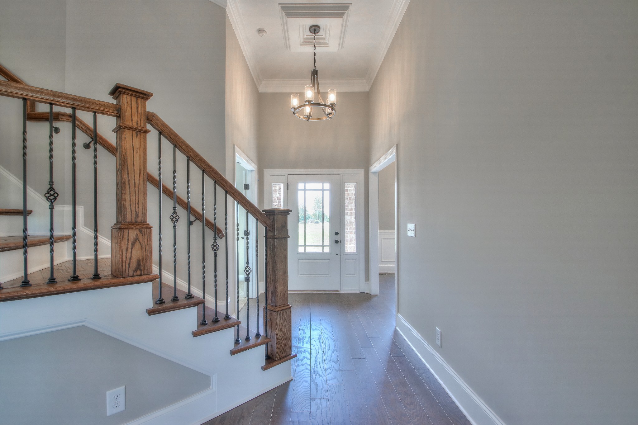 437 Burford Road Lebanon, TN 37087 - Photo 4 of 43 a view of staircase with wooden floor and fan