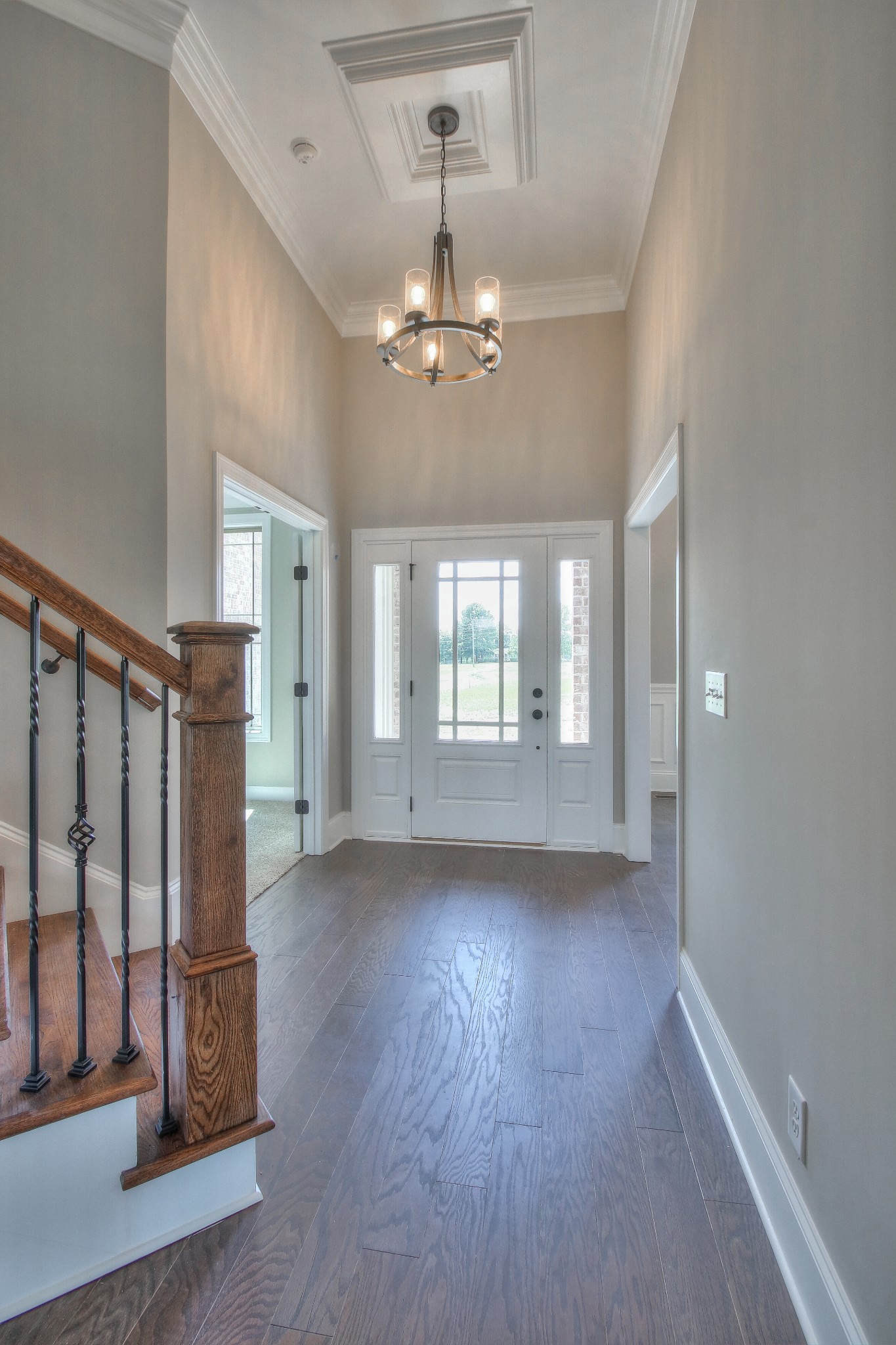 437 Burford Road Lebanon, TN 37087 - Photo 5 of 43 a view of an empty room with wooden floor and a window