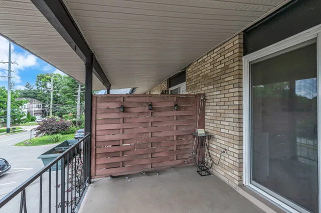 a view of a two chairs in the roof deck