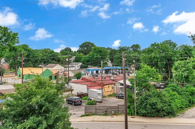 a view of street with sitting area