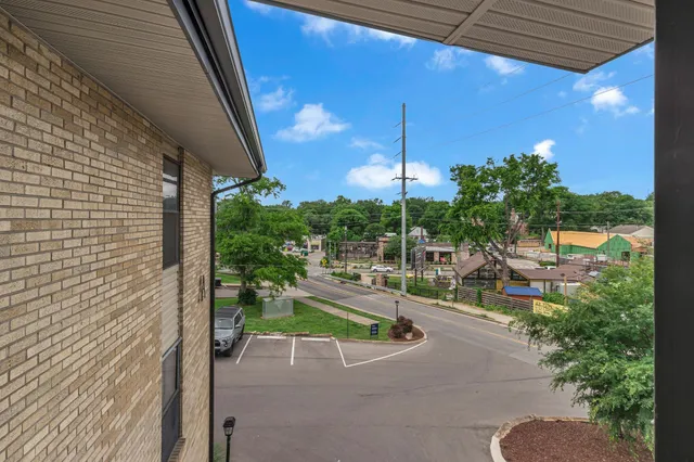 an aerial view of a house with outdoor space