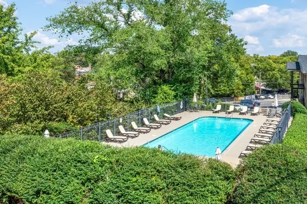 a view of a backyard with a tub