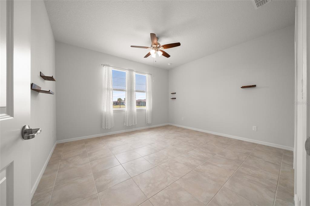 5947 Southwest 93rd Circle Ocala, FL 34481 - Photo 13 of 32 wooden floor in an empty room