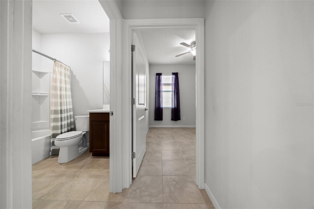 5947 Southwest 93rd Circle Ocala, FL 34481 - Photo 18 of 32 a bathroom with a toilet sink and tub