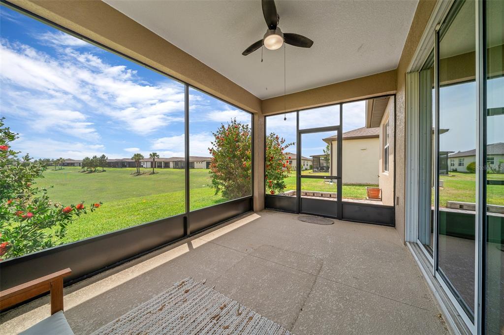 5947 Southwest 93rd Circle Ocala, FL 34481 - Photo 2 of 32 a view of an ocean and floor to ceiling windows